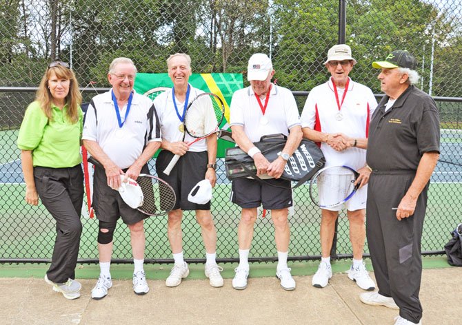 Men’s Doubles teams in the age bracket 80-89 pose with their medals. Gold medalists were Robert Barnard and Wayne Bell won the final against silver medalists Duff Rice and Ed Ladd. Also pictured are NVSO coordinators Anne Chase and Jim Viggiani.
