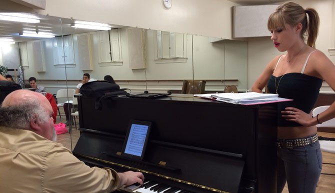 "The Rocky Horror Show's" Music Director Christopher A. Tomasino rehearses with Paige Taylor (Magenta).