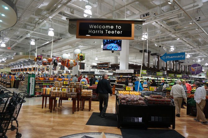 Grocery store Harris Teeter opened its doors Oct. 21 for a “Taste of Teeter” night to celebrate the grand opening of the new Old Town location. Located at the corner of Madison and St. Asaph streets, the store is open 24 hours and features a full service pharmacy, prepared foods, wines and an outdoor seating area.