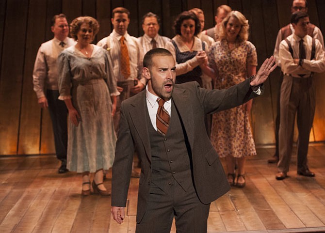 Charlie Pollock (Elmer Gantry) and company in “Elmer Gantry” at Signature Theatre.