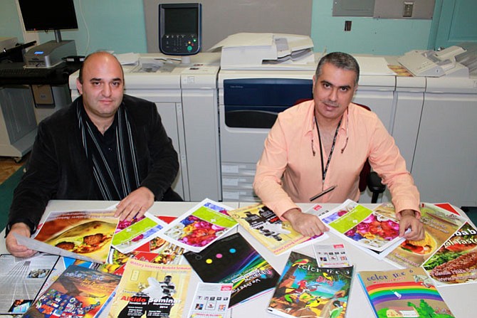 Samer Zaiber and Ahmed Al-Sammarraie in their printing studio, Liberty Printing House, that opened six months ago in town.
