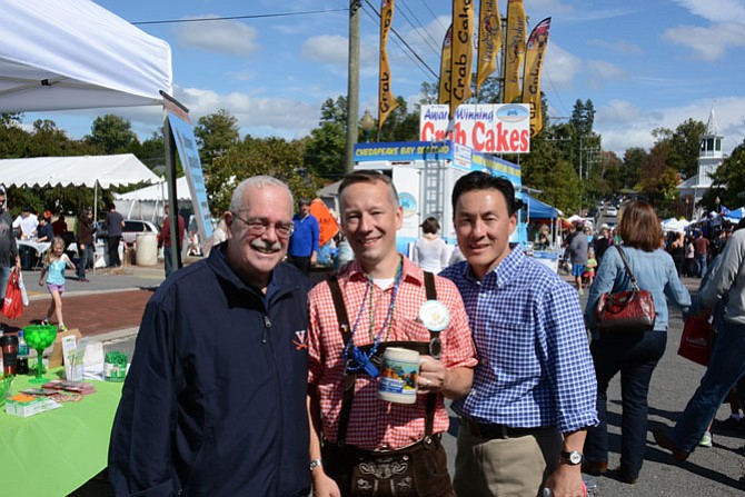 The 11th District incumbent Gerry Connolly (left), Burgermeister Greg Burkheart of Vienna (center) and Delegate Mark Keam practice their Deutsche at Vienna’s Oktoberfest celebration.