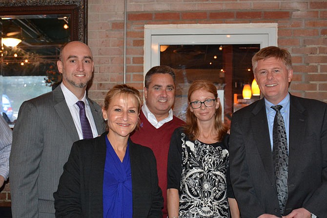 (From left) Shelter House Executive Director Joe Meyer, Fairfax County Sheriff Stacey Kincaid, Fairfax Mayor Scott Silverthorne, Fairfax CASA Executive Director Darcy Cunningham and Braddock Supervisor John Cook gather at Fairfax’s Coyote Grille to raise money for the two organizations.
