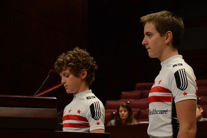 Middle school students Iain MacKeith (left) and Sam Yarashus (right), representing the National Captial Velo Club junior race team, encouraged the Board of Supervisors to adopt the new bicycle master plan.
