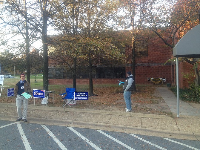 Outside the Cameron Glen Drive office in Reston, voters had the opportunity to pick up information on the midterm election. Fairfax County has the largest number of voting precincts in Virginia, with 238 voting locations spread throughout the county's 395 square miles.
