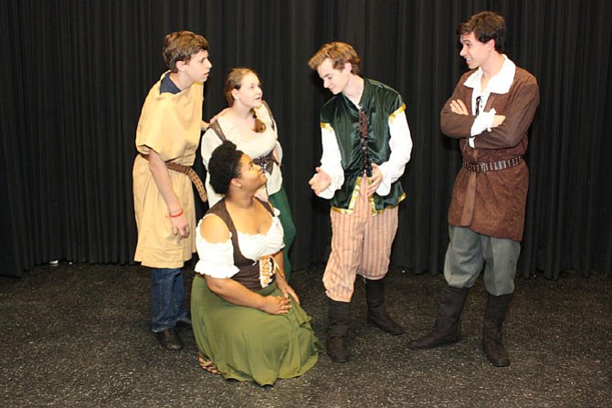 Nick Bottom (Jack Gereski - center) converses with his troupe of Mechanicals (from left: Ian Welfley, Samantha Sharrett, Maya Armstrong, T.J. Gouterman) about their upcoming performance.