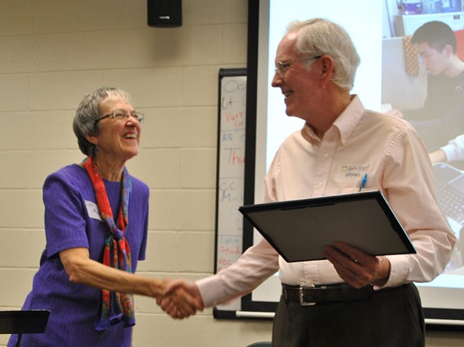 CIF President Alice Foltz congratulates top volunteer Stephen Vandivere.

