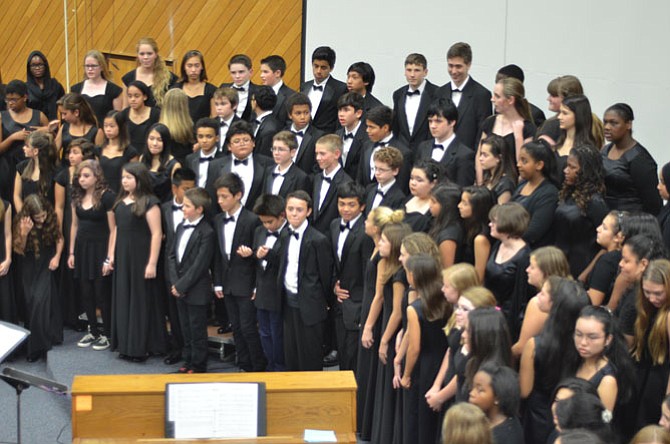 Students prepare for the fall chorus concert at Reston Langston Hughes Middle School. Students as well as parents were pleased with the fall concert performance.