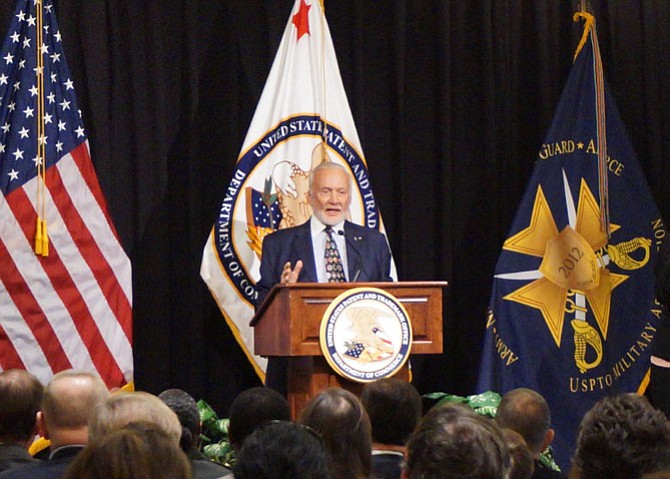 Former NASA astronaut Buzz Aldrin addresses a standing room only crowd at the USPTO  Military Association’s Veterans Day program Nov. 6.