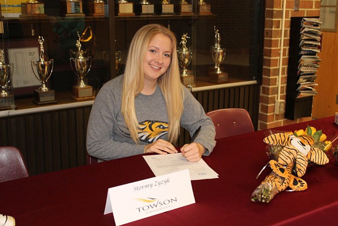 Mount Vernon senior Stormy Zyzyk signed a letter of intent to play softball at Towson University.
