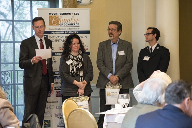 Sean O'Connell, chamber president, welcomes Nathan Bridges, The Salvation Army; Elizabeth McNally, UCM; and Keary Kincannon, Rising Hope Mission Church to the Chamber Business Breakfast.
