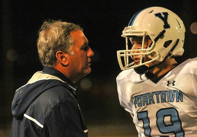 Yorktown senior Joe McBride, right, played quarterback for the Yorktown football team in the fall and plays basketball for the Patriots in the winter.