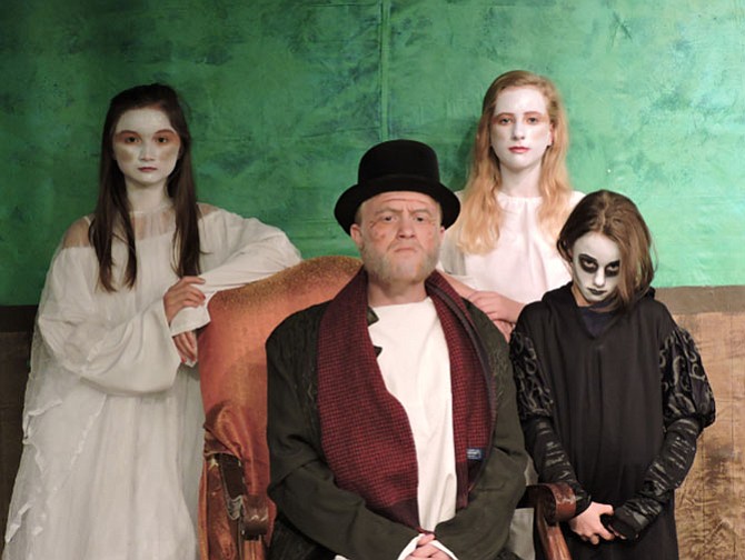 (From left) are Mary Walton Petersen, Kevin Gilroy, Rachel Nelson and Sarah Zakreski. Petersen and Nelson portray the ghosts of Christmas Past; Zakreski, the ghost of Christmas Future; and Gilroy, Ebenezer Scrooge.