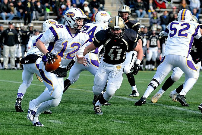 Westfield linebacker Jack Clancy (41) sets his sights on stopping Lake Braddock quarterback Kyle Edwards during the 6A North region semifinals on Nov. 29.