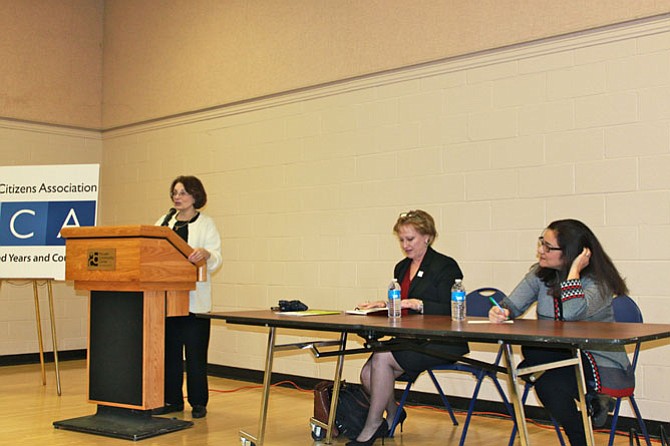 McLean Citizens Association President Sally Horn introduces Fairfax County Public Schools Superintendent Dr. Karen Garza and Louise Epstein, the vice president of the youth and education committee.
