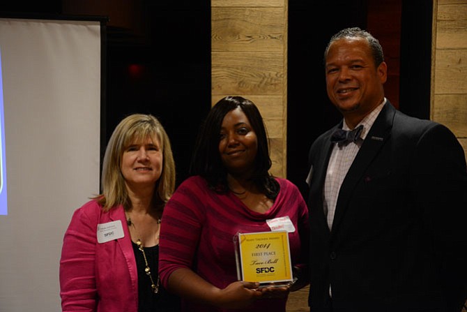 From left: SFDC Executive Director Edythe Frankel Kelleher, Taco Bell Regional General Manager Yolanda Frye and SFDC board of directors president Walter Clarke recognize Taco Bell with the first prize Mary Thonen Highway Beautification Award.