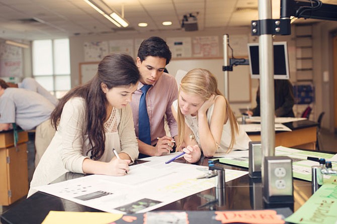 Students at Episcopal High School in Alexandria collaborate on a school project. Essays and interviews help admissions teams determine how an applicant would fit into the school community.
