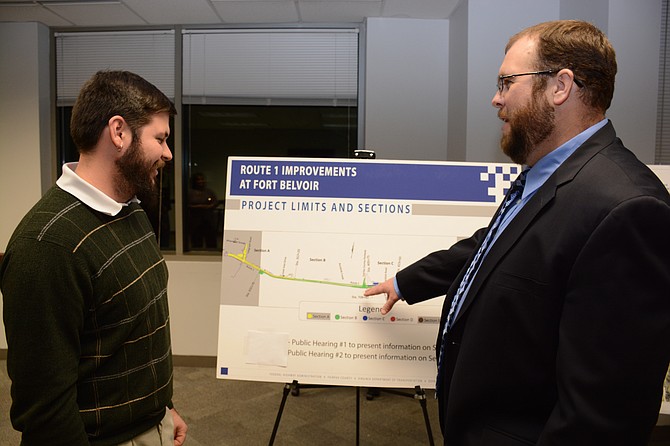 Tim Brown (right) with the Eastern Federal Lands Highway Division of the Federal Highway Administration points out the five areas of U.S. Route 1 improvements to Adam Vencill, a project team member who lives in Maryland.
