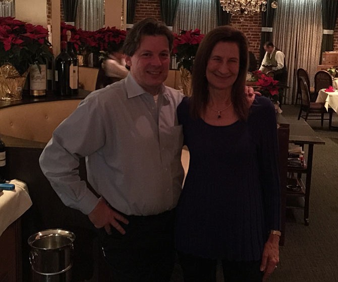 Owner Laurent Janowsky, left, welcomes California winemaker Merry Edwards to La Bergerie restaurant Dec. 9. 