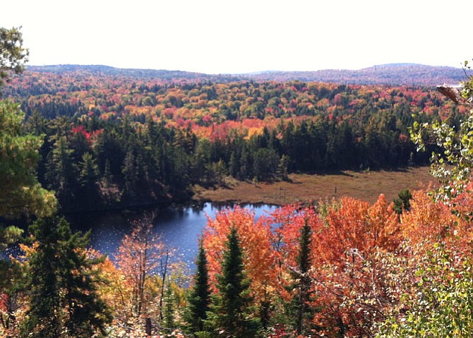 In Maine, with 100 miles to go, the changing foliage shows that summer was over. 