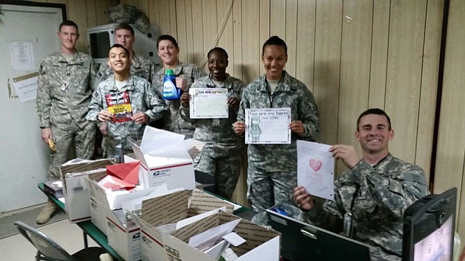 American troops deployed in Afghanistan receive care packages sent from and America’s Adopt A Soldier event held in Springfield on Christmas Day.
