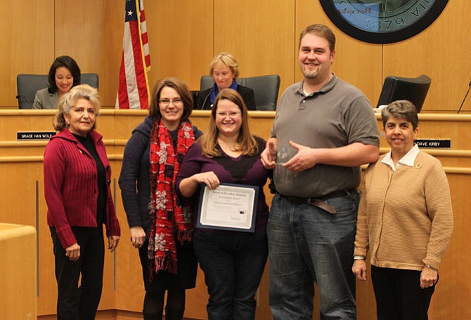 Tooran Shadman, Mayor Lisa Merkel, Shannon and David Mathews and Barbara Glakas after the 2014 Good Neighbor Award presentation Jan. 13.