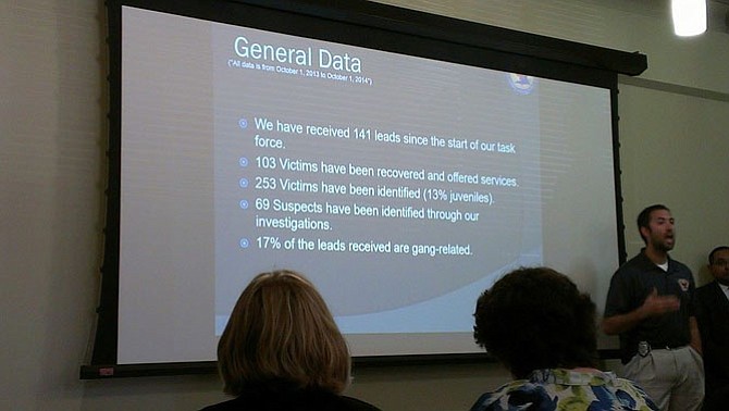 Detective Bill Woolf (right) of the FCPD Human Trafficking Unit speaks about the "Just Ask" Prevention Project at a meeting Oct. 2, 2014. 
