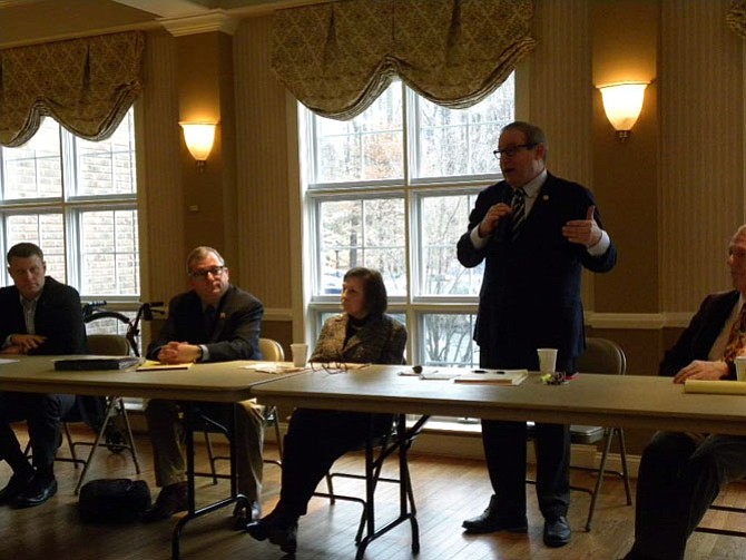 From left, Supervisor Jeffrey McKay, state senators Adam P. Ebbin and Linda T. Puller, Del. Mark D. Sickles, and state senator George Barker hold a town hall meeting at Thompson Center in Alexandria on Saturday, Jan. 24.
