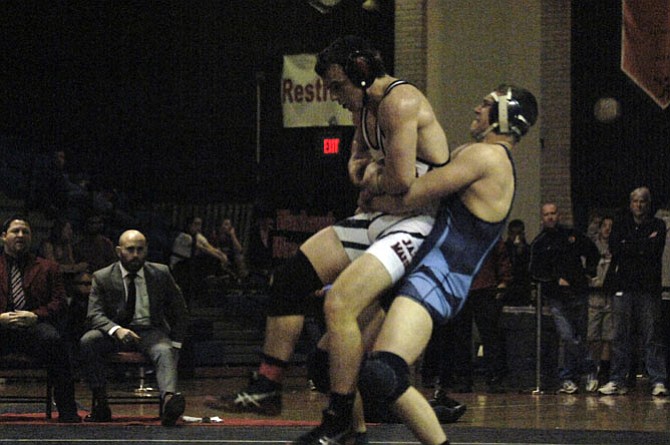 Yorktown senior Jason Kappel, right, won the 195-pound title at the Conference 6 wrestling championship tournament on Feb. 7 at Hayfield Secondary School.