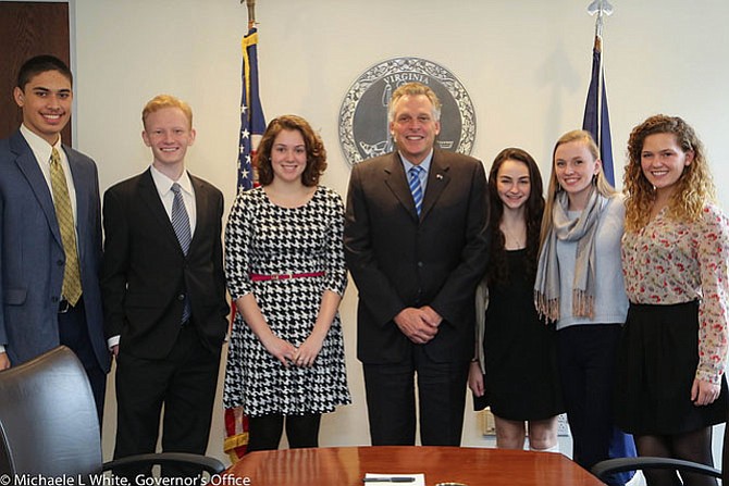 From left: West Potomac High School junior Taamson Joshua, WPHS senior Kelly O'Meara, Mount Vernon High School Senior Catherine Ming, WPHS junior Emma Kelly, WPHS senior Margaret O'Meara and WPHS senior Jayne Orleans meet with Gov. Terry McAuliffe (center) at the Amundson Institute.
