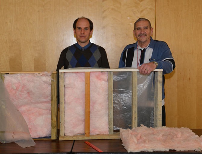 Architect Peter Henry and seminar host and presenter Rich Taschler showed the differences between standard wall construction and the super-insulated double wall/staggered stud method of framing that conserves a homes energy using a few handy props.
