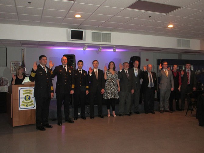 The VVFD 2015 elected officers are sworn-in by Vice-Mayor Edythe Kelleher.