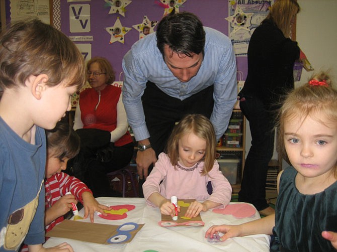Parents join in the fun at the Creche Valentine’s Day party.