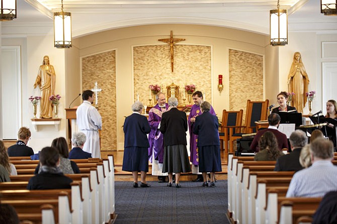 The Founders Day celebration at Marymount University began with a 10:30 a.m. Mass at the school's Sacred Heart of Mary Chapel. 
