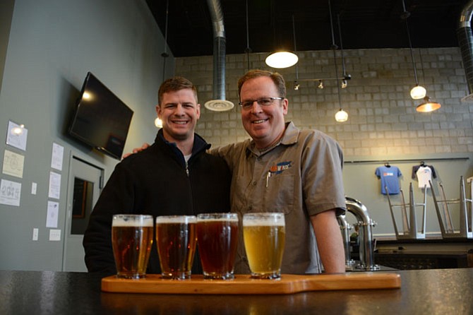 Fair Winds Brewing Company head brewer Charlie Buettner (left) of Burke and founder Casey Jones of Falls Church opened their new facility in Lorton in March 2015.
