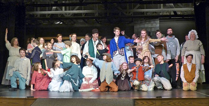 The full cast of “Oliver!” the musical, opening at the Church of the Good Shepherd, spans ages 5 to 75.