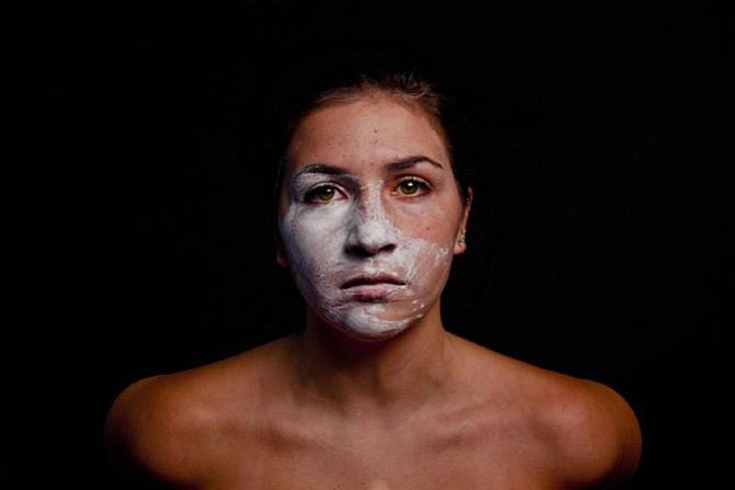 Katie Douglas, “Removing the Mask,” photograph from Emerging Visions, 2014