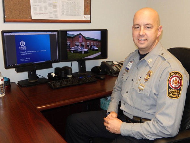 Capt. Bob Blakley at his desk in the Sully District Station.