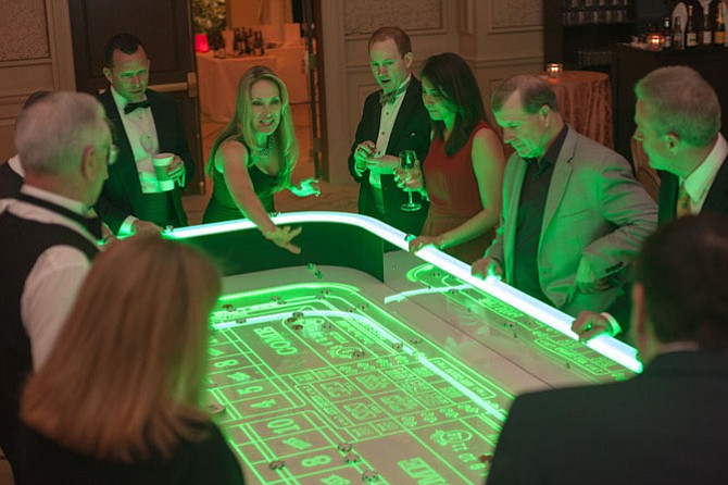 A bet on behalf of education is never empty ... guests at the Dulles Regional Chamber’s annual casino fundraiser for education enjoyed a selection of blackjack, craps, roulette and more. 
