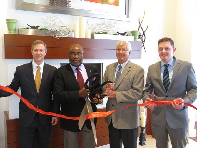 At the Hilton Garden Inn’s opening: From left are Jim Brinkman, CFO Clark Enterprises; Mayor William Euille; Oliver Carr, president and CEO of Carr Properties; and Rich Lingenfelter, director of Brand Performance Support for Hilton Worldwide.
