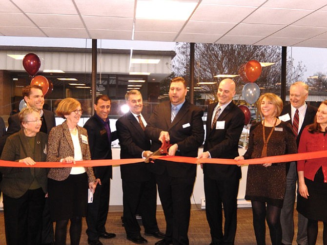 Joel Bednoski cuts the ribbon for the new center.
