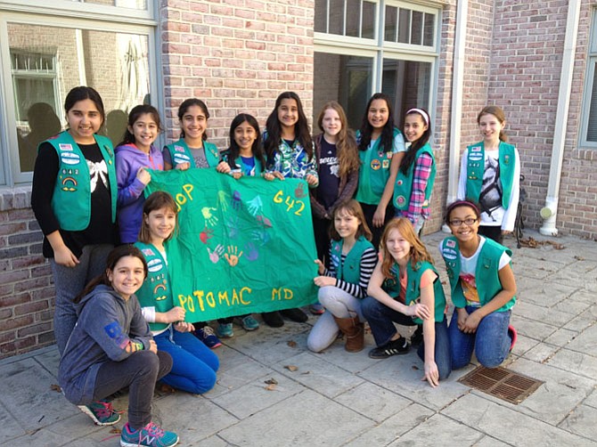 Junior Girl Scouts, members of Troop 642, are collecting shoes forSoles4Souls.
