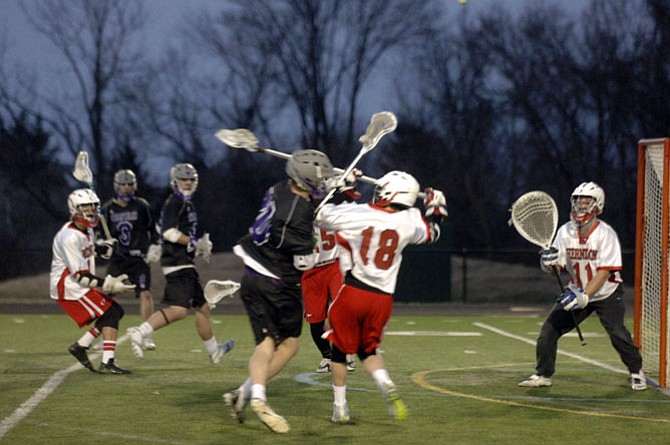 Herndon goalkeeper Ryan Mach, right, finished with 17 saves against Chantilly on March 23.