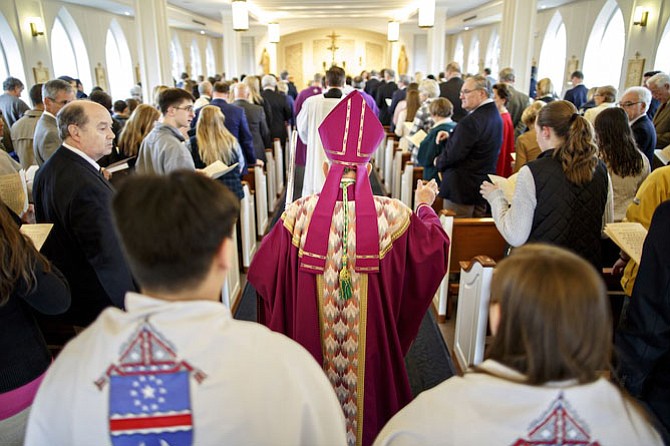 The Most Rev. Paul S. Loverde of the Catholic Diocese of Arlington enters Marymount University’s Sacred Heart of Mary Chapel for the Mass and Chapel Blessing, March 22.