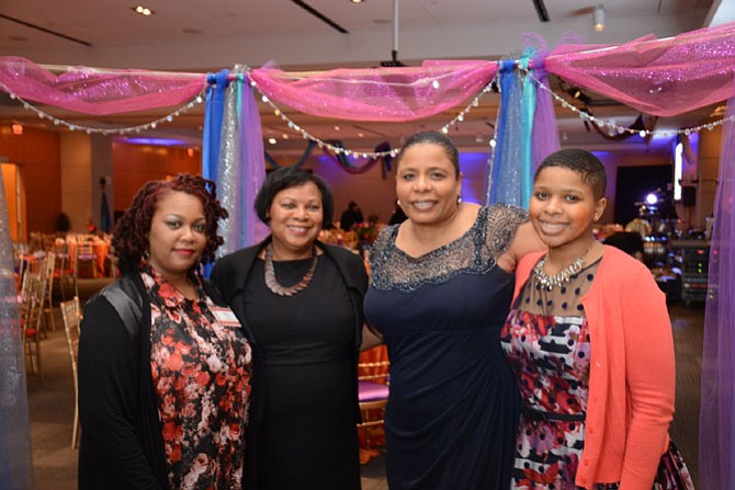 From left: Torria Baker, director of the UCM-Bryant Early Learning Center; Minnie McClure with the Early Learning Center; UCM executive director Nichelle Mitchem and UCM volunteer Danielle Adamson gather for the UCM Spring Gala, hosted by the Friends of UCM.