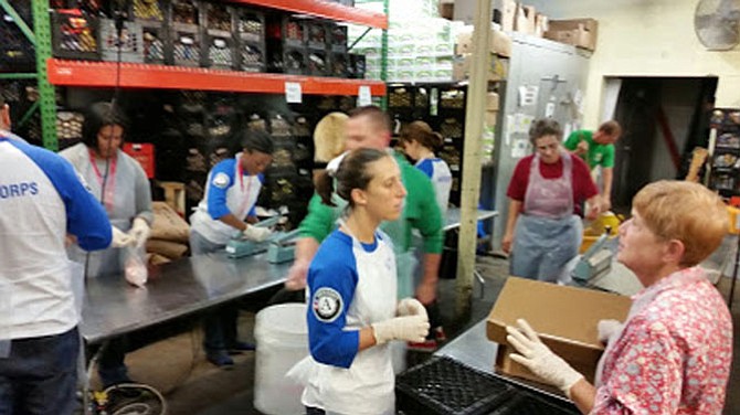 Chicken bagging for the Arlington Food Assistance Center September 2014. 