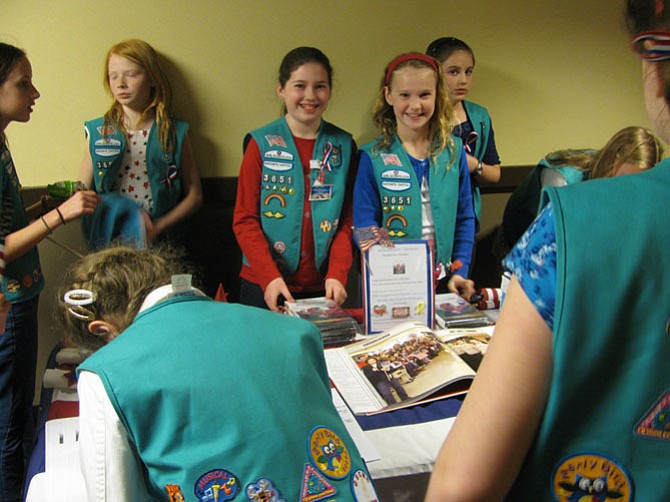 Girl Scout Troop 3651 sold out their fundraising screening of Honor Flight at Herndon's Worldgate 9 theater on March 16. Honor Flight tells the story of a nationwide effort to fly World War II veterans to Washington, D.C., to visit the monuments built in their honor.