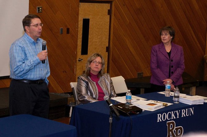 Sully Supervisor Michael Frey welcomes attendees to the annual Sully Budget Town hall meeting, to his right are Susan Datta, Director Fairfax County Department of Management and and School Board member Kathy Smith.