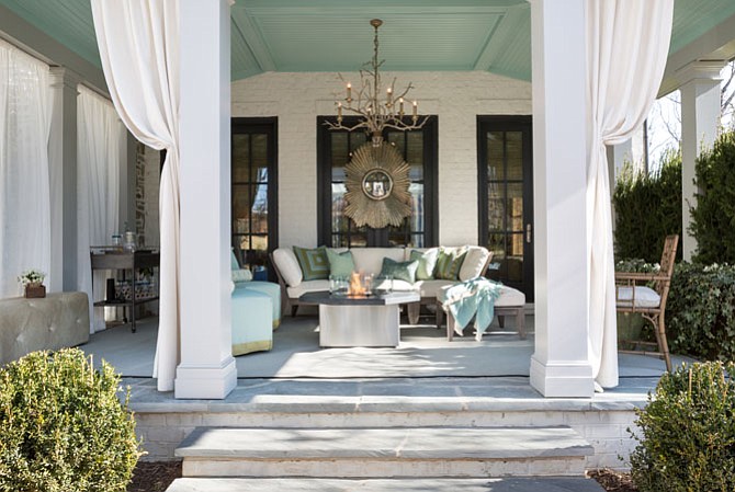 The home's loggia, designed by Nancy Colbert of Design Partners in McLean, offers views of the home's natural surroundings.