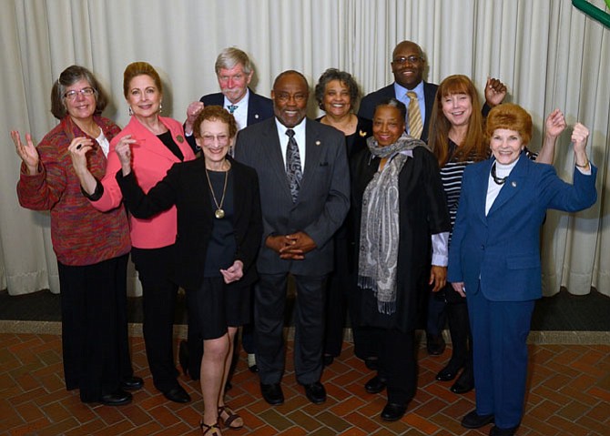 First row, from left, are Nina Tisara, Mayor Bill Euille, Joyce Rawlings, Councilwoman Del Pepper; second row, Kathleen Baker, Kate Campbell Stevenson representing Marga Fripp, Fred Parker, Alice P. Morgan, Councilman John Chapman and Gayle Reuter. 
